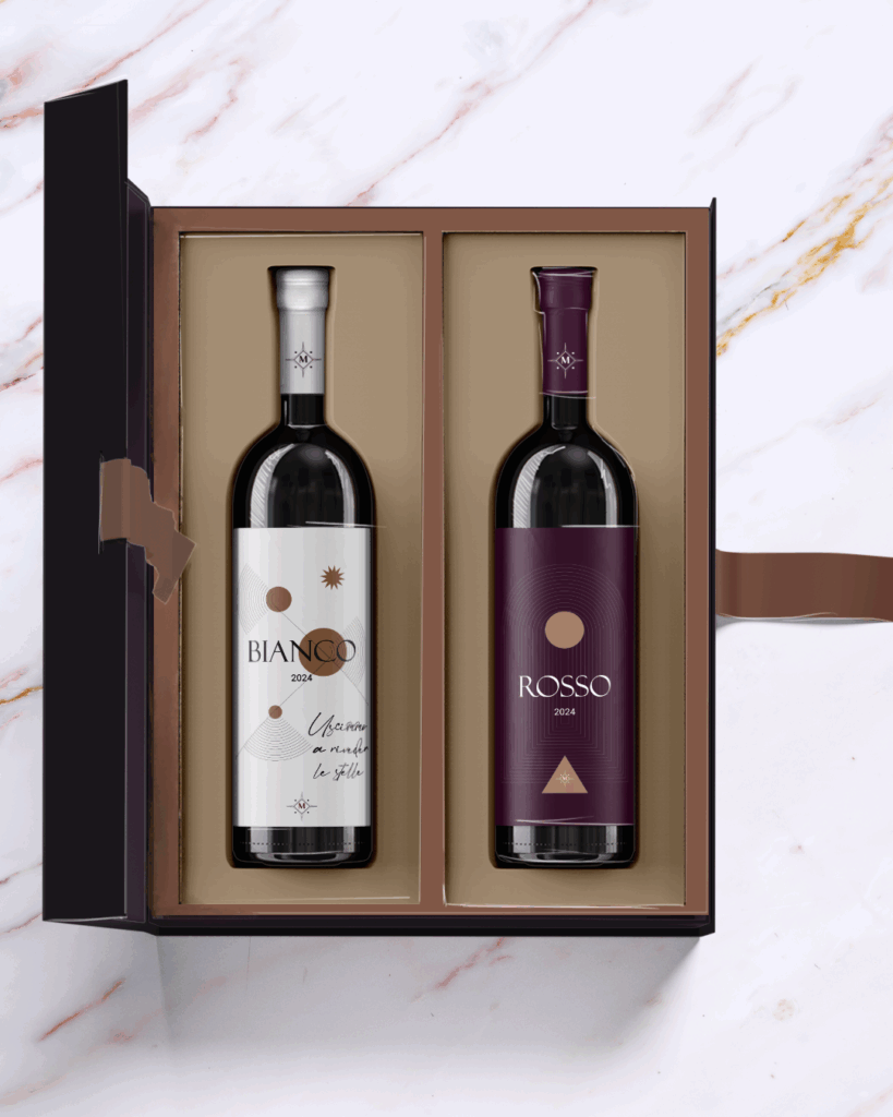 una box luxury aperta con dentro due bottiglie dalle etichette eleganti